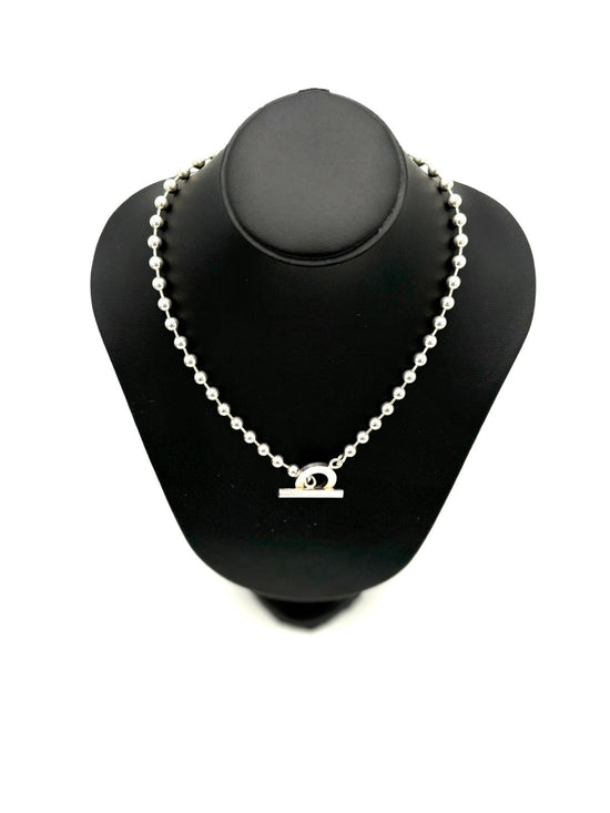 Collana Gucci con chiusura taggle .