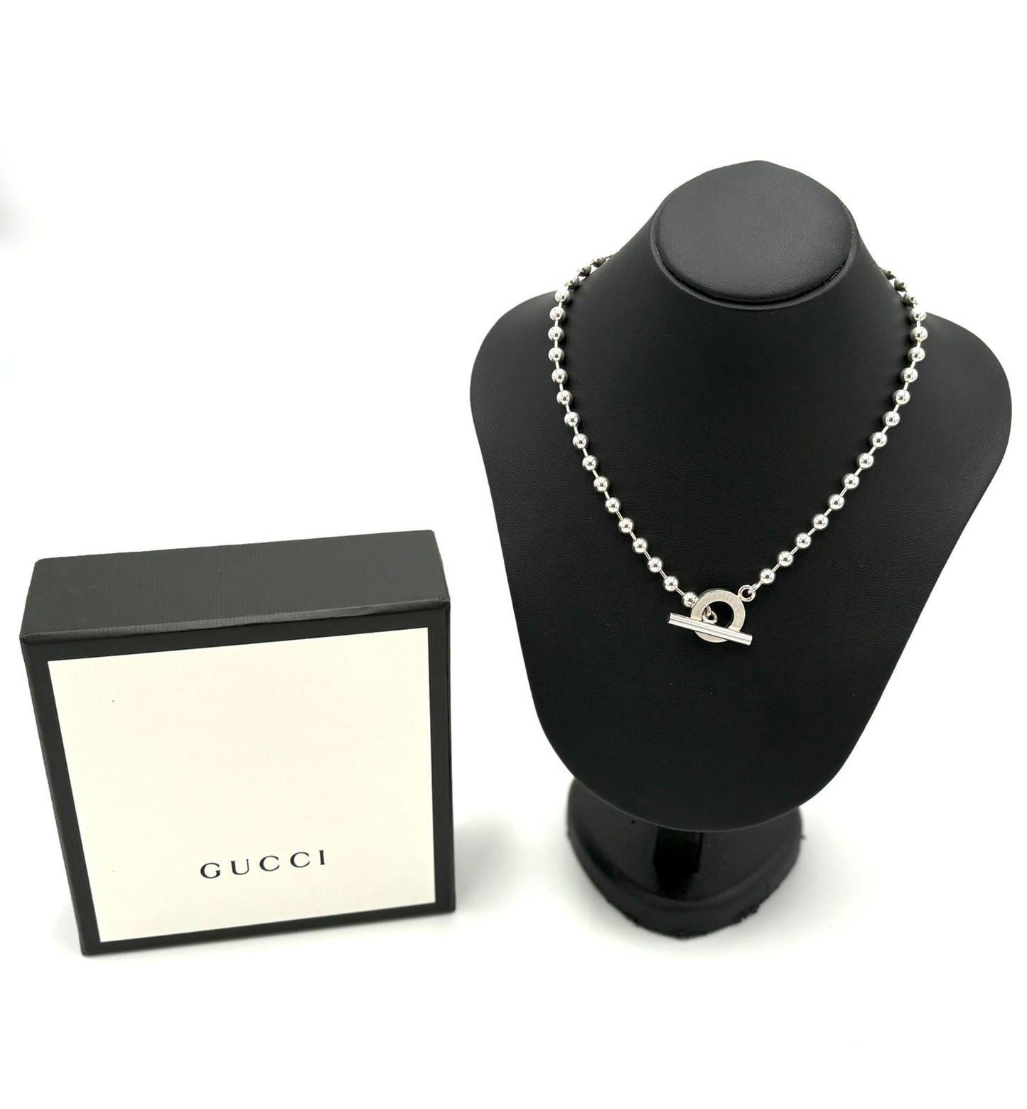 Collana Gucci con chiusura taggle .